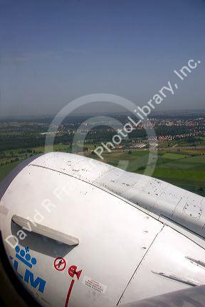 A view out the window of the jet engine of an airliner leaving Munich, Germany.