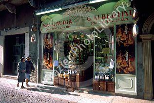 Street scene and meat market at Verona, Italy.