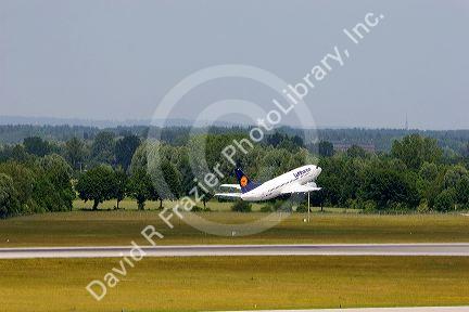 Lufthansa Boeing 737 airplane takes off at Munich airport, Germany.