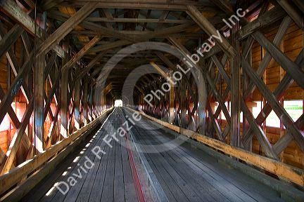 The interior structure of the Pont Perreault covered bridge crossing the Chaudiere River at Nortre-Dame-Des-Pins south of Quebec City, Quebec, Canada.