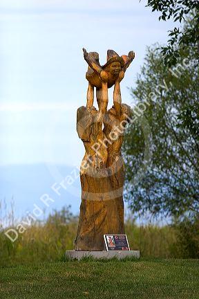 Wood sculptures at Parc des Trois Berets in the village of St.-Jean-Port-Joli along the St. Lawrence River, Quebec, Canada.