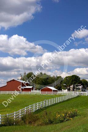 A red barn and farm at Pamona, Kansas.