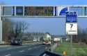Speed limit signs change with conditions along Autostrada near Milan, Italy.