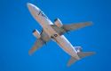 Frontier Airlines boeing 737 in flight.
