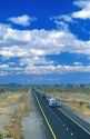 Trucks and automobiles traveling on Interstate 80 near Lovelock, Nevada.
