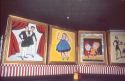 Framed paintings of circus posters displayed at the Ringling Circus Museum in Sarasota, Florida.