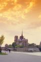 Sunset along thr River Seine in Paris near Notre Dame Cathedral.
