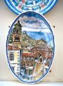 Ceramic  plate on display depicting Amalfi, Italy cathederal.
