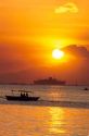 Ships at anchor in Manila Bay, Philippines at sunset.