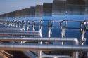 Solar energy concentrators at an electric generation plant in the Mojave Desert, California.