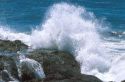 Waves crash against the rocky coast of Oregon.