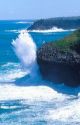 Waves crashing along the Kauai,  Hawaii coastline.
