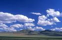Cumulus clouds over Malheur County, Oregon high desert mountains.