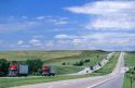Trucks travel on Interstate 80 near Lodgepole, Nebraska.  View looking west.