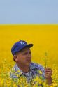 A farmer checks his rapeseed farm also known as canola near Grangeville, Idaho.