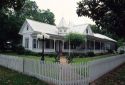 House with picket fence in Fredericksburg, Texas.