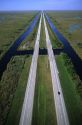 An aerial view of Interstate 75 alligator alley in the Florida Everglades.