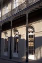 Shadows and wrought iron balconies in the French Quarter, New Orleans, Louisiana.