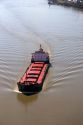 Bulk material ship on the Mississippi River near New Orleans, Louisiana.