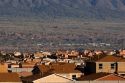 Housing development at Bernalillo, New Mexico in the area of Albuquerque.  Sandia Mountains in background.