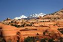 A view of snowy La Sal mountains and sandstone along US highway 191 south of Moab, Utah.