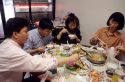 Chinese people eating a meal in a restaurant, Taiwan.