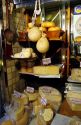 A window display of cheese in Italy.