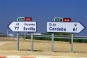 Highway direction signs along N-IV in Spain.