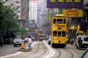 Street scene with trolleys in the city of Hong Kong.