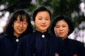 Female Chinese students in uniform at a Buddhist school in Hong Kong.