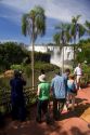 Tourists take photographs of the waterfalls at Iguazu, Argentina.