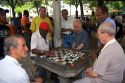 Elderly men playing checkers at a park in Rio de Janeiro, Brazil.