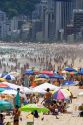 Crowded beach scene at the Copacabana Beach in Rio de Janeiro, Brazil.