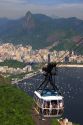 View of Rio de Janeiro and cable car on Sugarloaf Peak, Brazil.