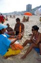 A beach vendor selling shrimp at the Copacabana Beach in Rio de Janeiro, Brazil.