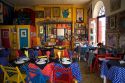 Interior of a colorful cafe in Colonia, Uraguay.