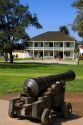 A cannon sits in front of the Visitor Center at Old Town, San Diego, California.