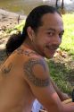 Tahitian man with traditional tattoos on the island of Moorea.