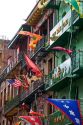 Apartments with balconies and flags in Chinatown, San Francisco, California.