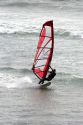 Windsurfing in the pacific ocean on the California coast.