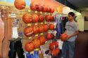 Teen shops for a basketball at a sporting goods store in Boise, Idaho.