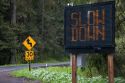 Radar operated digital road sign warning motorists to slow down on U.S. 101 north of Eureka, California.