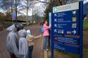 Children read a sign at the entrance to the Smithsonian National Zoological Park in Washington, D.C.