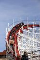 People ride a rollercoaster at the Santa Cruz Beach Boardwalk, California.