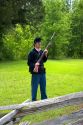 Civil war soldier reenactor and park ranger at Shiloh National Park battlefield, Tennessee.
