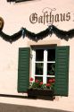 Window with flower box on a hotel in the alpine village of Garmisch, Germany.
