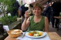 A woman having lunch at a restaurant in the village of Ribeauville, Eastern France.
