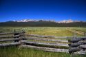 Sawtooth Mountains and rail fence at Stanley Basin, Idaho.