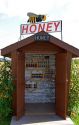 A self serve honey stand on a farm at Prince Edward Island, Canada.