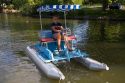 Fifteen year old girl uses a paddlewheel boat on the lagoon in Julia Davis Park, Boise, Idaho.